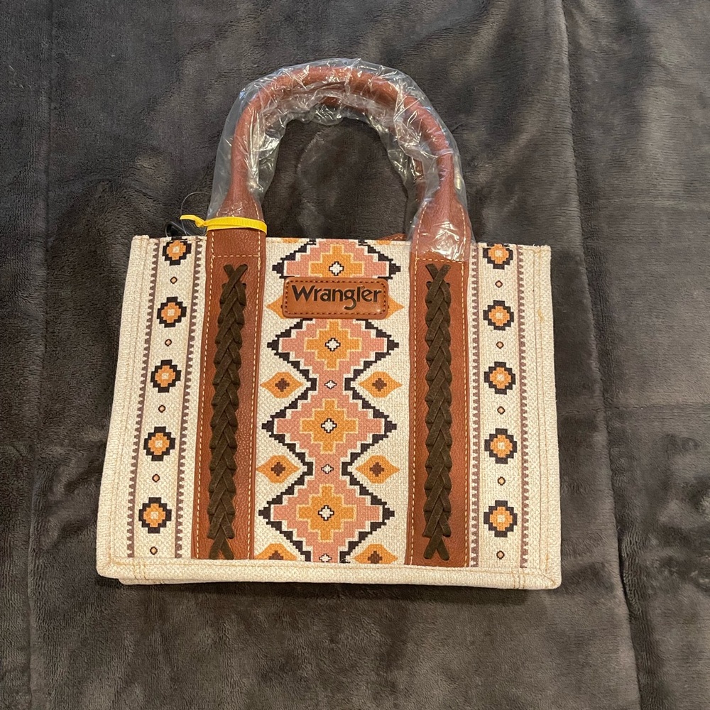 BRAND NEW wrangler bag small, over shoulder strap.